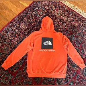 The North Face “Never Stop Exploring” hoodie sweatshirt
